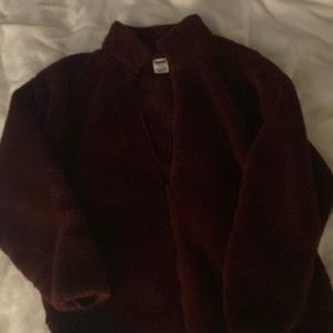 Brand Pink, maroon fluffy zip up, with pockets inside, and size large